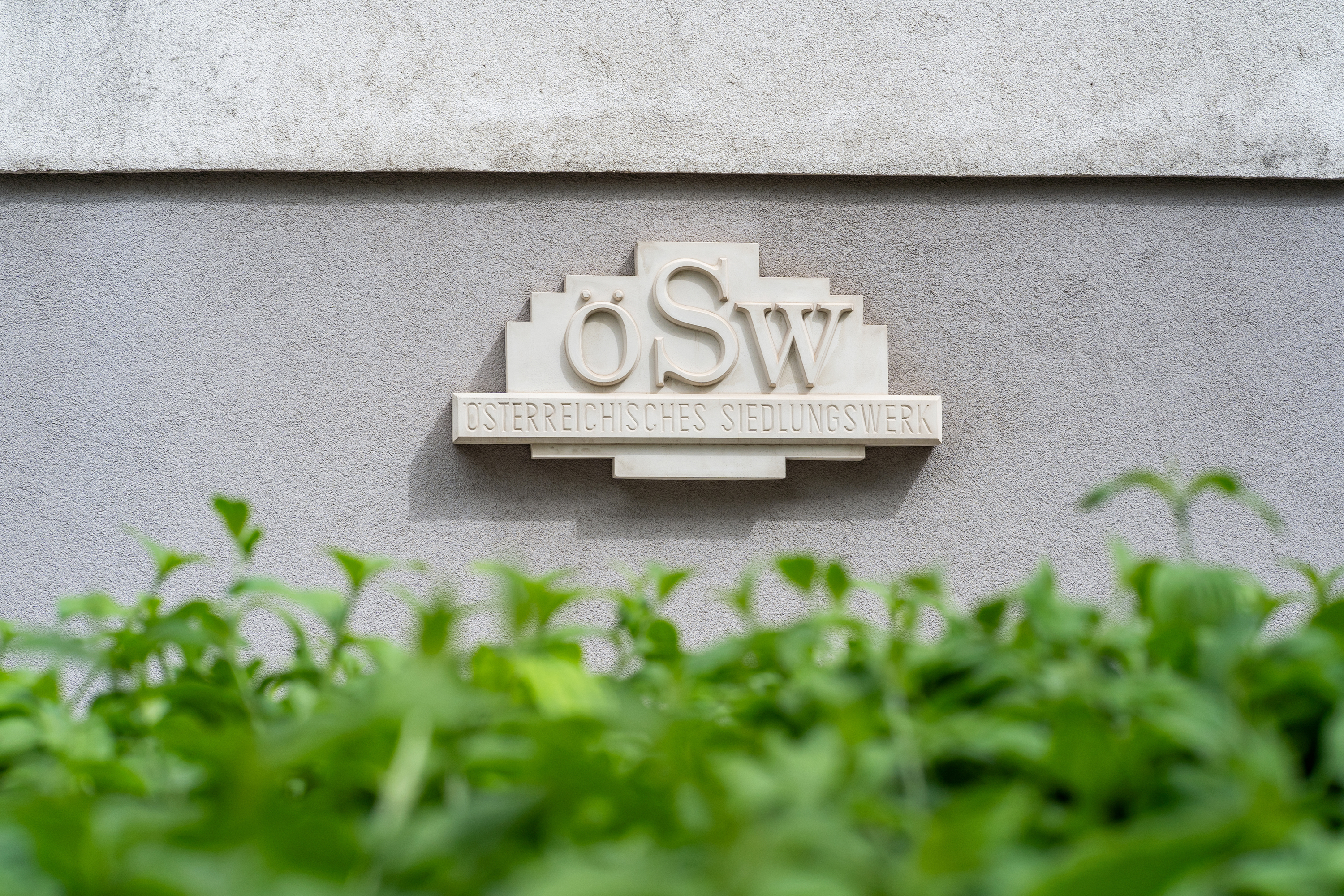 ÖSW AG Logoplakette Ansicht der Logoplakette der ÖSW AG